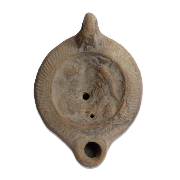 Roman oil lamp with Serapis and Isis