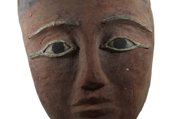 Egyptian bearded mummy mask with bronze eyes
