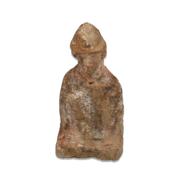 Roman statuette of a crouching figure with hat