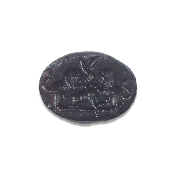 Roman intaglio stone depicting two lions attacking a deer
