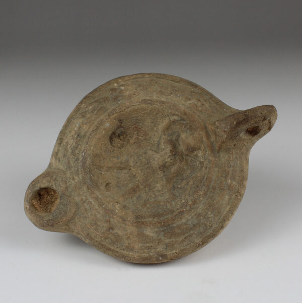 Roman oil lamp with Diana with bow