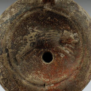 Roman oil lamp with dog