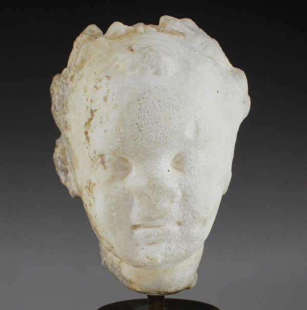 Roman portrait head of a laureated child