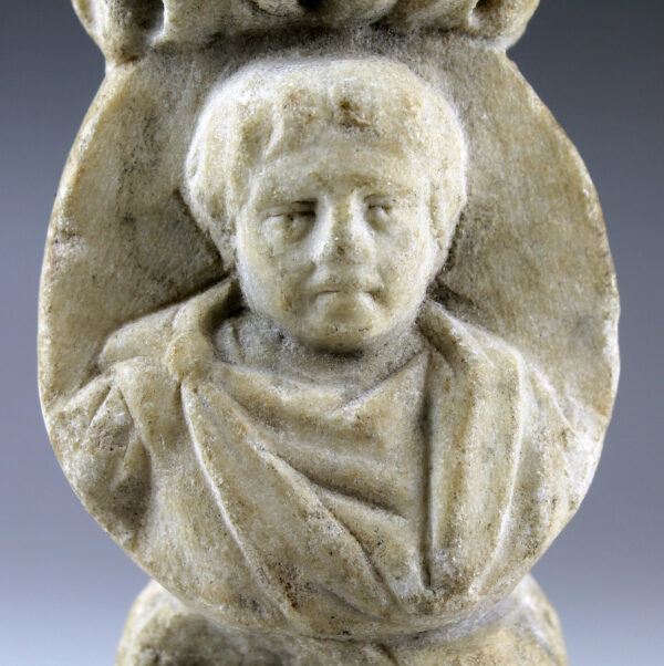 Roman fragment of a pilaster with two medallions or tondo with young men portraits