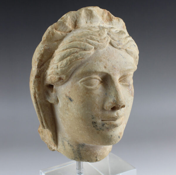 Roman head of a woman with a headdress