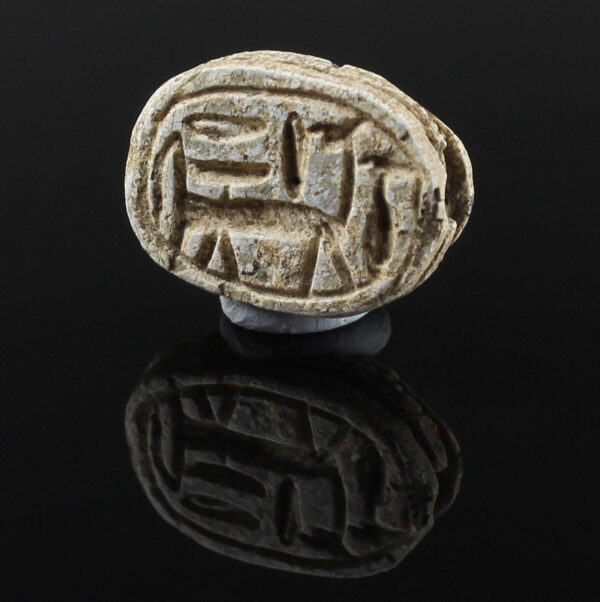Egyptian scarab with horse with schematic signs with inscription Amun