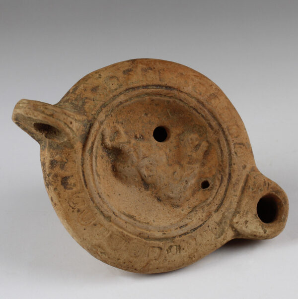 Roman factory oil lamp with Africa