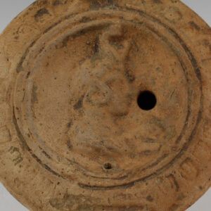 Roman factory oil lamp with Africa