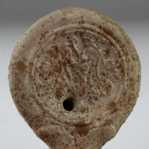 Roman oil lamp with leaves and fruit