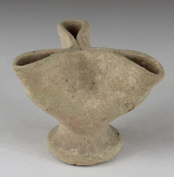Iron Age oil lamp with three nozzles