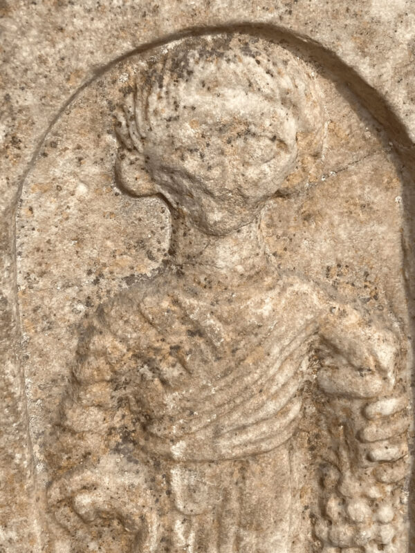 Roman stele with a young grape picker