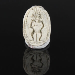 Egyptian scarab with god Bes