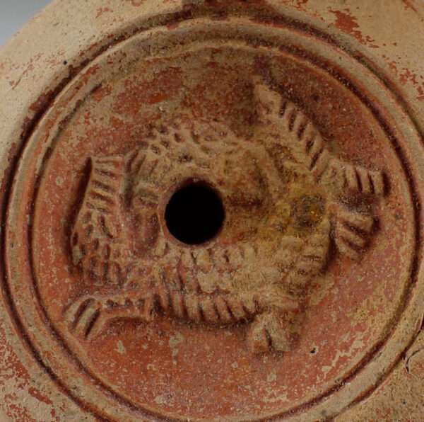 Roman factory oil lamp with a lion and a crocodile