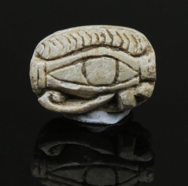 Egyptian scarab of pharaoh Akhenaten with and Udjat eye on the back