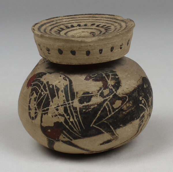 Greek aryballos depicting a rider with horse